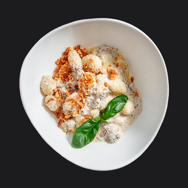 Ньокки с томлёной говядиной и сливочно-трюфельным соусом Ньокки с томлёной говядиной и сливочно-трюфельным соусом заказать доставку в Красноярске | «Перцы» в Красноярске