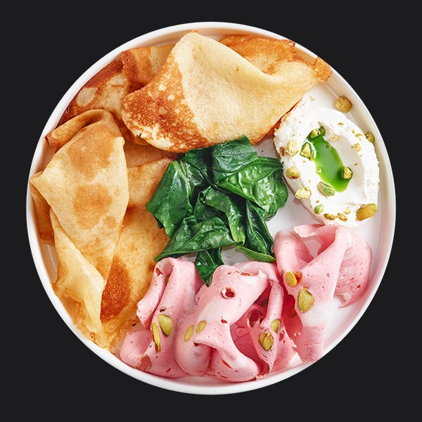 Блинчики с мортаделлой томленым шпинатом, соусом крем-чиз и фисташками Блинчики с мортаделлой томленым шпинатом, соусом крем-чиз и фисташками заказать доставку в Красноярске | «Перцы» в Красноярске