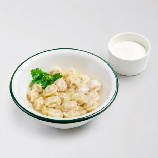 Куриные пельмешки в бульоне с деревенской сметаной Куриные пельмешки в бульоне с деревенской сметаной заказать доставку в Красноярске | Доставка «Беллини»