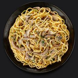 Паста с шампиньонами, языком и грецким орехом